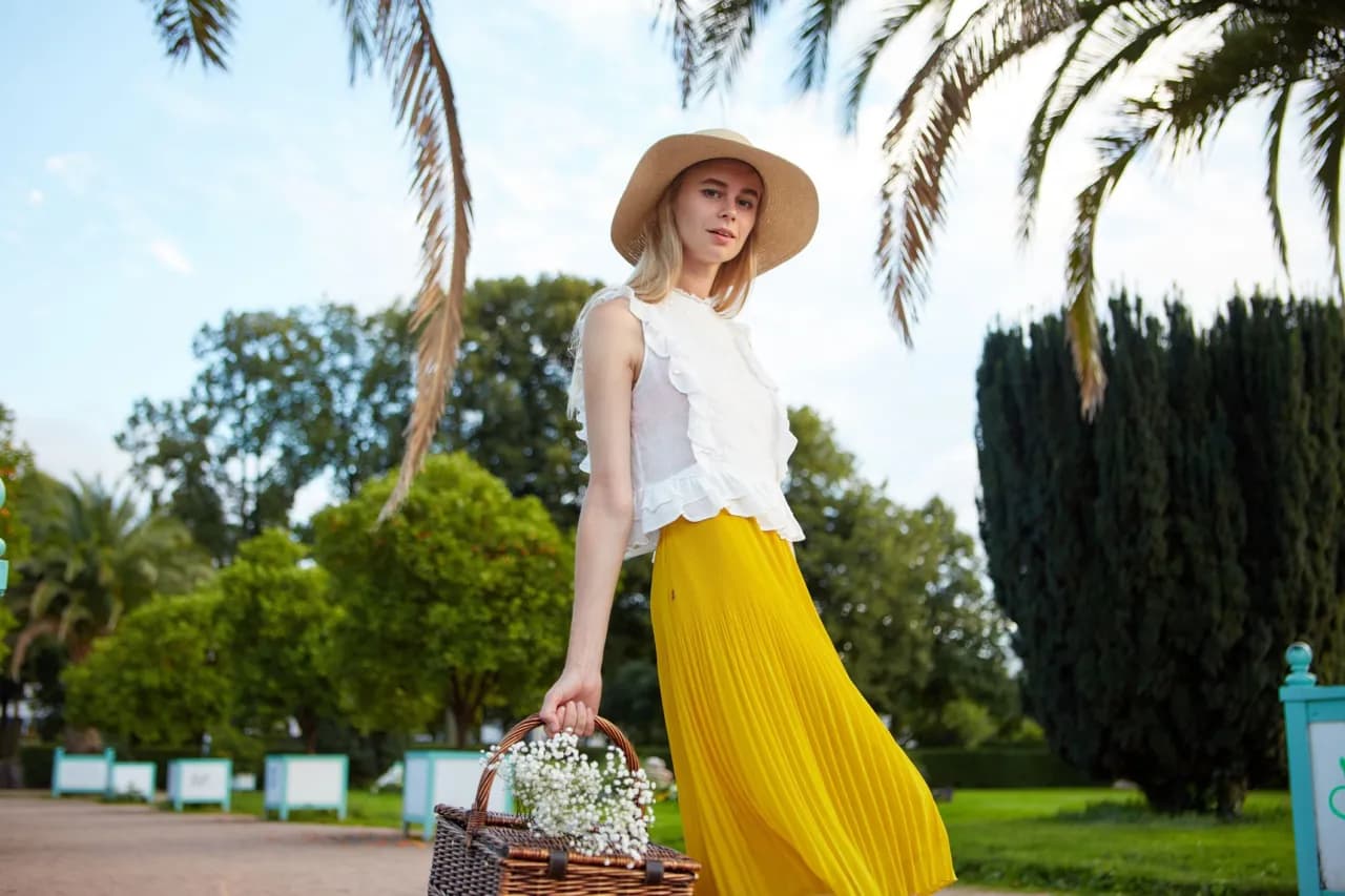 Stylizacje spódnicy do połowy łydki, które odmienią Twój look